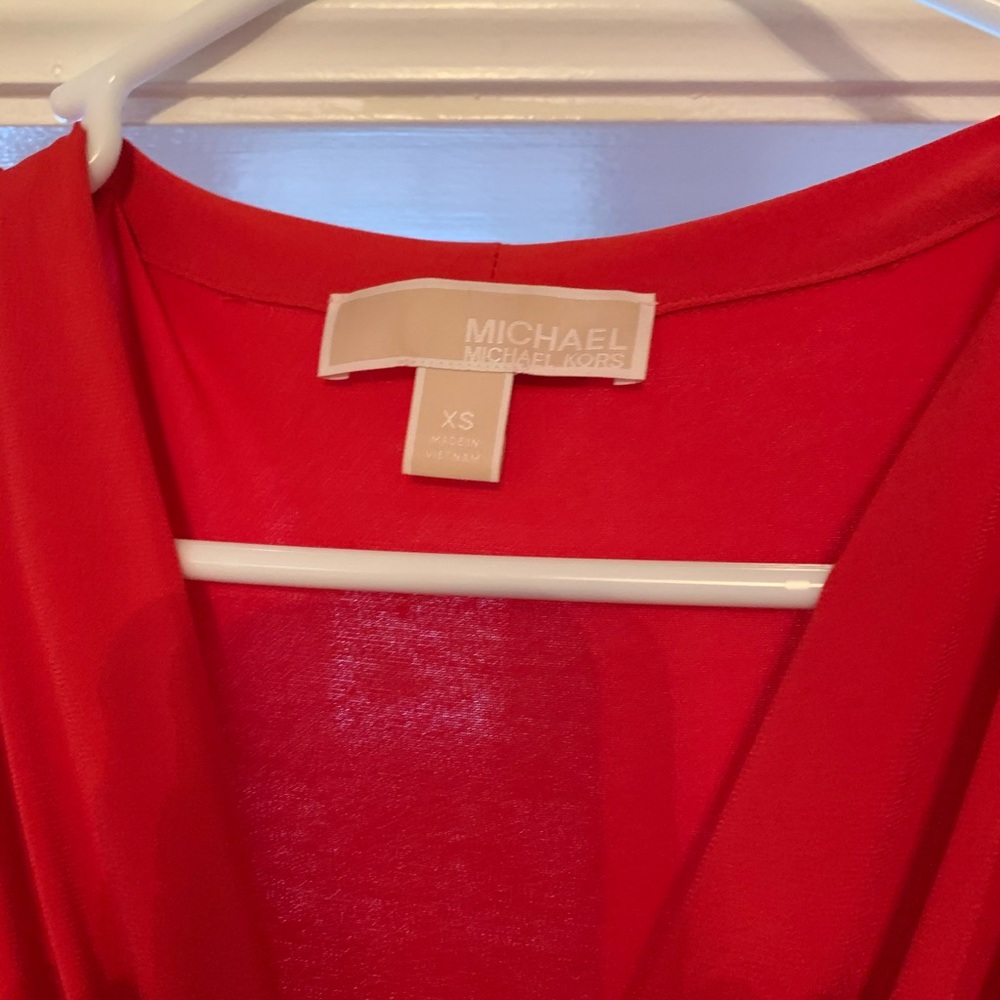 Red Michael kors high low, wrap dress.